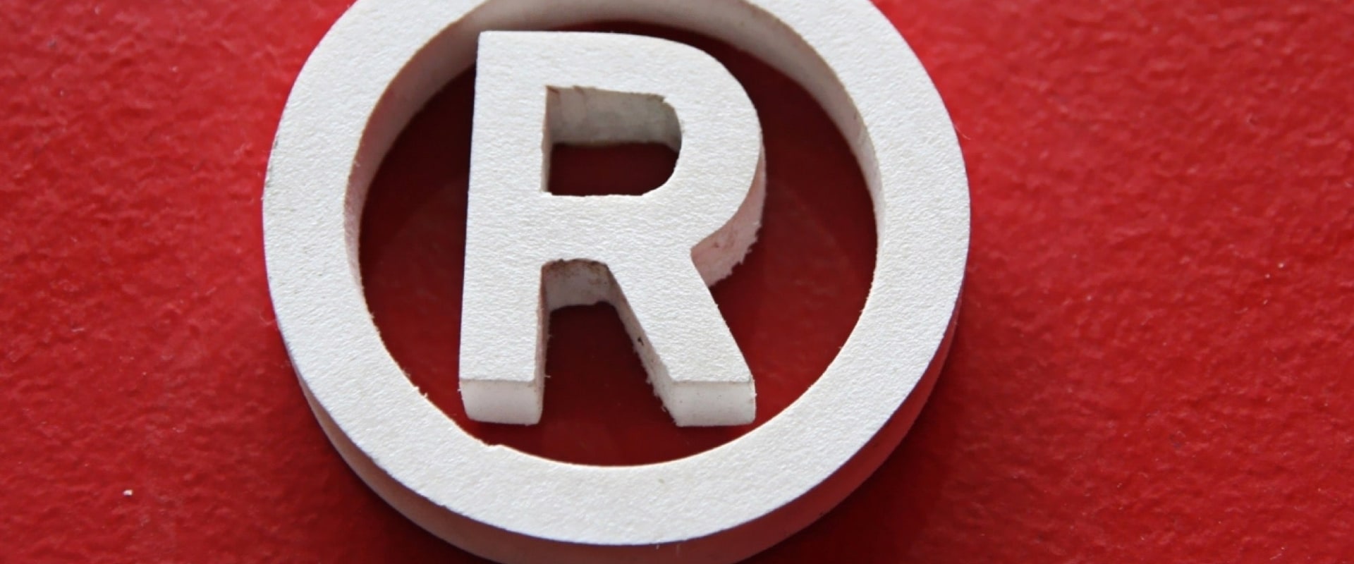 What is trademark name any two types of trademark?